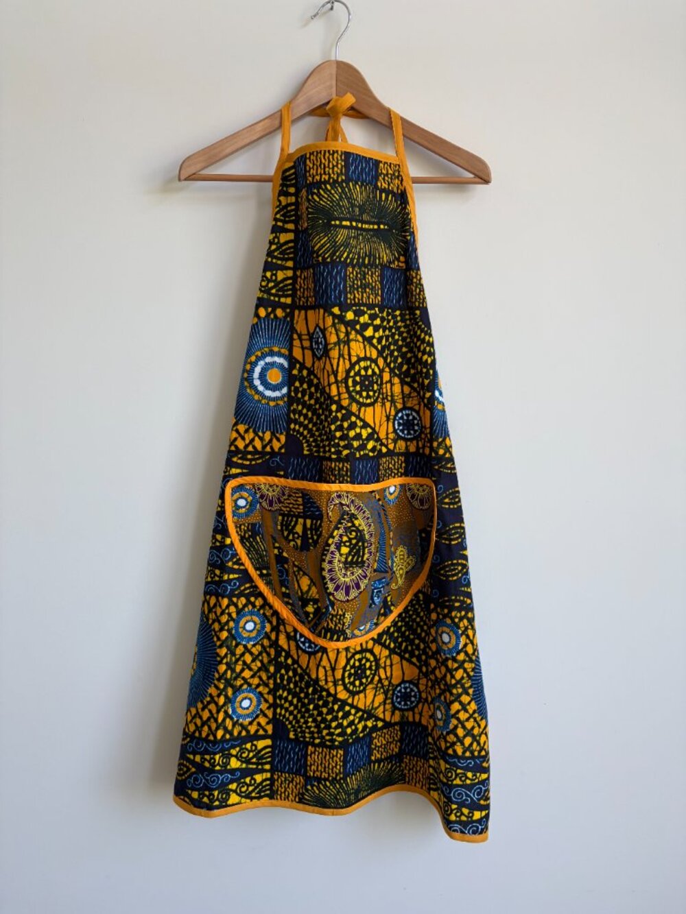 Vibrant deep yellow and blue abstract artsy apron with front pocket